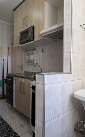 Apartamento à venda com 49m², 2 quartos e 1 vaga Apartamento à venda com 49m², 2 quartos e 1 vagaCozinha e Área de Serviço