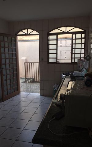 Casa à venda com 250m², 4 quartos e 2 vagas Casa à venda com 250m², 4 quartos e 2 vagasCozinha