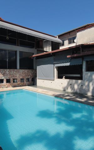 Casa à venda com 406m², 4 quartos e 3 vagasPiscina