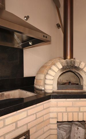 Casa à venda com 230m², 3 quartos e 3 vagasÁrea Gourmet - Churrasqueira e Forno