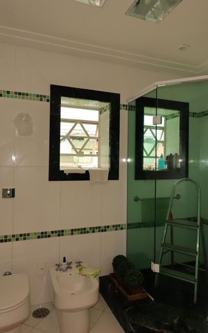 Casa à venda com 230m², 3 quartos e 3 vagasBanheiro da Suíte