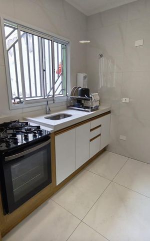 Casa à venda com 125m², 3 quartos e 2 vagas Casa à venda com 125m², 3 quartos e 2 vagasCozinha