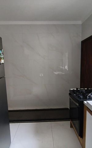 Casa à venda com 125m², 3 quartos e 2 vagas Casa à venda com 125m², 3 quartos e 2 vagasCozinha