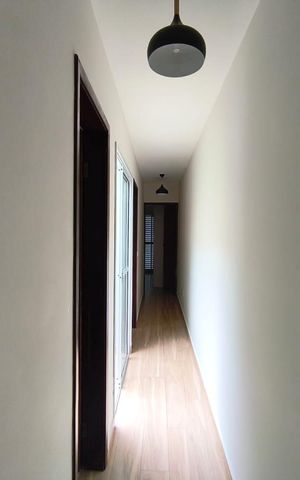 Casa à venda com 125m², 3 quartos e 2 vagas Casa à venda com 125m², 3 quartos e 2 vagasCorredor