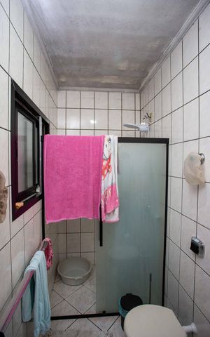 Casa à venda com 290m², 2 quartos e 7 vagasBanheiro da Suíte