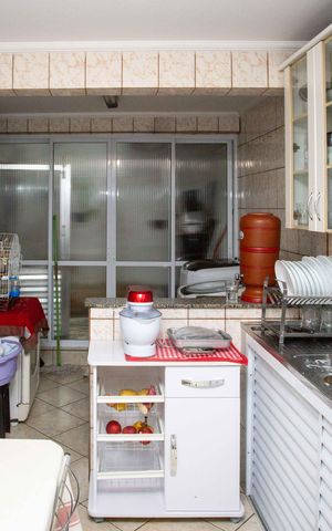 Casa à venda com 290m², 2 quartos e 7 vagasCozinha Casa 1