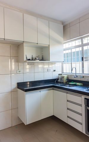 Casa à venda com 110m², 3 quartos e 2 vagas Casa à venda com 110m², 3 quartos e 2 vagasCozinha