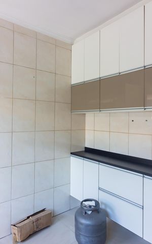 Casa à venda com 110m², 3 quartos e 2 vagas Casa à venda com 110m², 3 quartos e 2 vagasCozinha