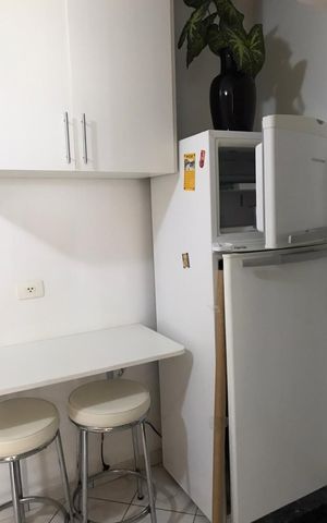 Apartamento à venda com 27m², 1 quarto e 1 vaga Apartamento à venda com 27m², 1 quarto e 1 vagaCozinha