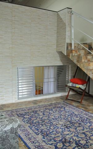 Casa à venda com 220m², 3 quartos e 2 vagasSala de convivência 