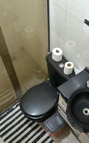 Casa à venda com 220m², 3 quartos e 2 vagas Banheiro da área Convivência/Churrasqueira 