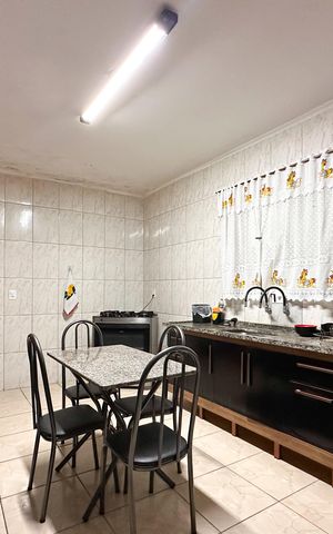 Casa à venda com 138m², 2 quartos e 2 vagas Casa à venda com 138m², 2 quartos e 2 vagasCozinha