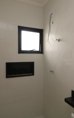 Casa à venda com 103m², 2 quartos e 4 vagasBanheiro da Suíte 2