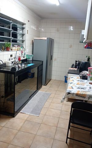 Casa à venda com 60m², 3 quartos e 1 vaga Casa à venda com 60m², 3 quartos e 1 vagaCozinha