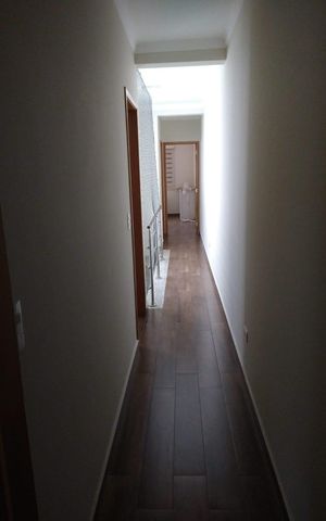 Casa à venda com 127m², 3 quartos e 2 vagas Casa à venda com 127m², 3 quartos e 2 vagasCorredor