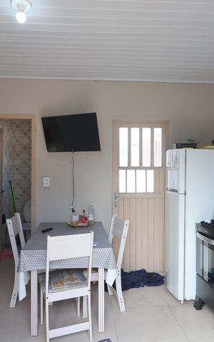Casa à venda com 150m², 5 quartos e sem vagaSala/Cozinha