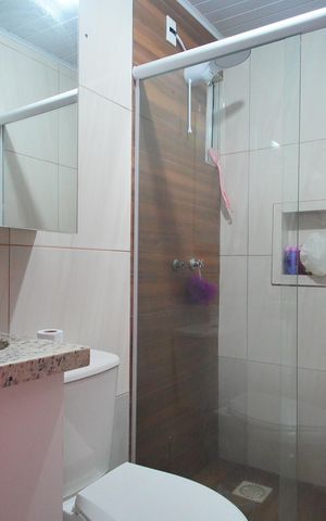 Casa à venda com 98m², 2 quartos e 1 vagaBanheiro 2