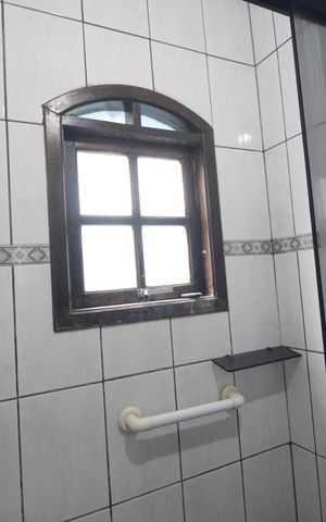 Casa à venda com 125m², 5 quartos e 2 vagasBanheiro da suíte