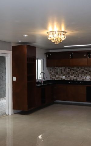 Casa à venda com 110m², 3 quartos e 3 vagasSala e Cozinha integrada 