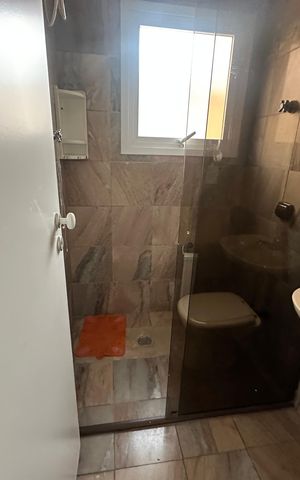 Casa de condomínio à venda com 565m², 4 quartos e 3 vagasBanheiro de serviço