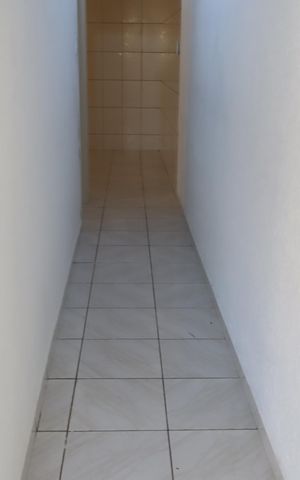 Casa à venda com 60m², 1 quarto e 2 vagasCorredor