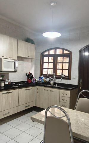 Casa à venda com 180m², 3 quartos e 3 vagas Casa à venda com 180m², 3 quartos e 3 vagasCozinha