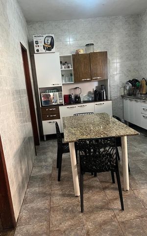 Casa à venda com 149m², 3 quartos e 2 vagas Casa à venda com 149m², 3 quartos e 2 vagasCozinha