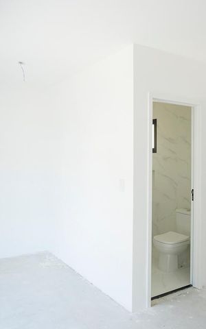 Casa à venda com 185m², 3 quartos e 2 vagasSuíte 1