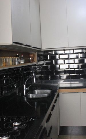 Apartamento à venda com 59m², 2 quartos e 1 vagaCozinha com lavanderia