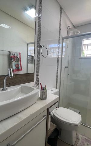 Casa à venda com 215m², 3 quartos e 2 vagas Casa à venda com 215m², 3 quartos e 2 vagasBanheiro da Suíte