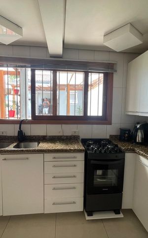 Casa à venda com 215m², 3 quartos e 2 vagas Casa à venda com 215m², 3 quartos e 2 vagasCozinha