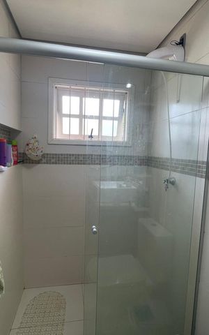 Casa à venda com 215m², 3 quartos e 2 vagas Casa à venda com 215m², 3 quartos e 2 vagasBanheiro da Suíte