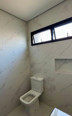 Casa à venda com 210m², 3 quartos e 4 vagas Casa à venda com 210m², 3 quartos e 4 vagasBanheiro 1