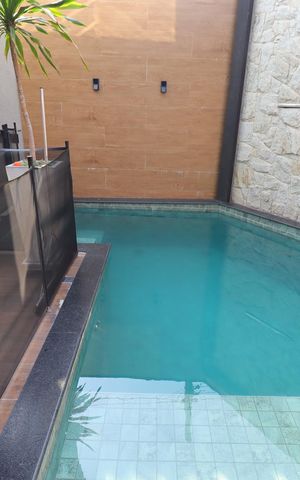Casa à venda com 180m², 3 quartos e 3 vagasÁrea Gourmet do Térreo - Piscina