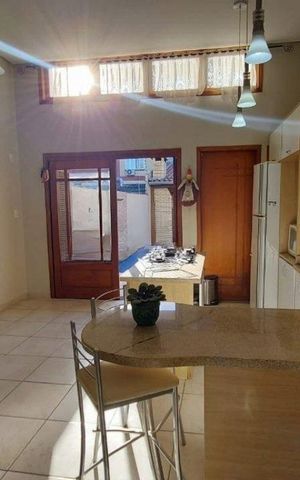 Casa de condomínio à venda com 200m², 4 quartos e 3 vagas Casa de condomínio à venda com 200m², 4 quartos e 3 vagasSala / Cozinha