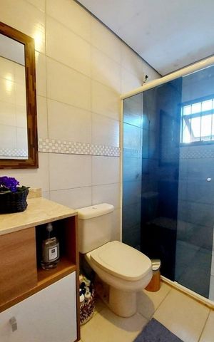 Casa de condomínio à venda com 200m², 4 quartos e 3 vagas Casa de condomínio à venda com 200m², 4 quartos e 3 vagasBanheiro 1
