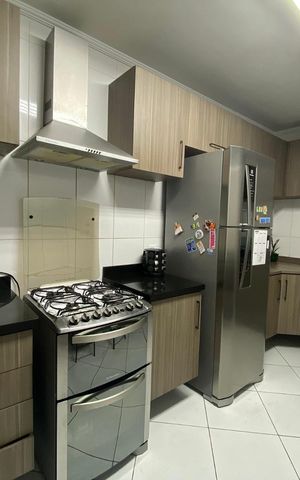 Casa à venda com 111m², 3 quartos e 2 vagas Casa à venda com 111m², 3 quartos e 2 vagasCozinha