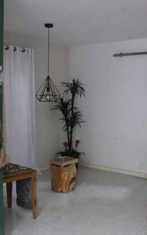 Casa de condomínio à venda com 96m², 3 quartos e 2 vagasSala