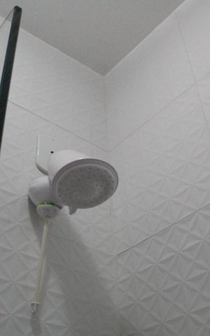 Casa de condomínio à venda com 96m², 3 quartos e 2 vagasBanheiro de serviço