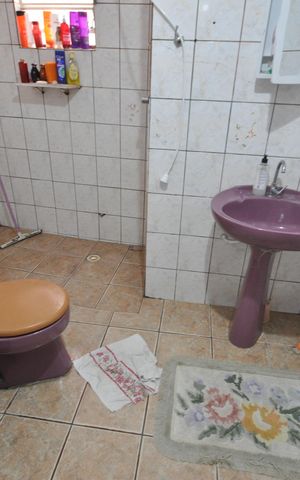 Casa à venda com 300m², 7 quartos e sem vagaBanheiro da Suíte