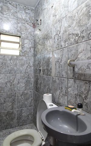 Casa à venda com 210m², 4 quartos e 1 vagaBanheiro
