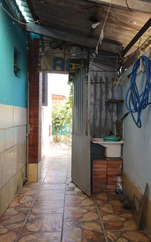 Casa à venda com 210m², 4 quartos e 1 vagaÁrea de Serviço