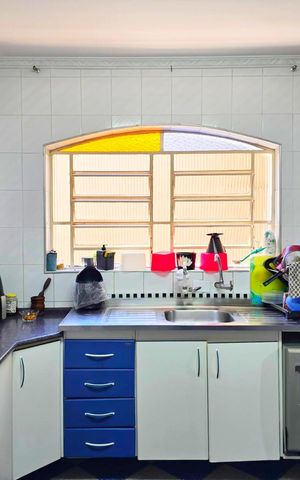 Casa à venda com 108m², 3 quartos e 2 vagas Casa à venda com 108m², 3 quartos e 2 vagasCozinha