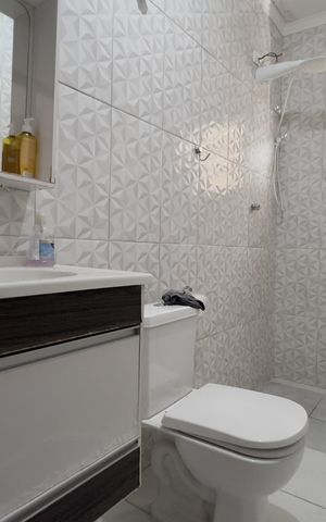 Casa à venda com 128m², 3 quartos e 2 vagas Casa à venda com 128m², 3 quartos e 2 vagasBanheiro da Suíte 1