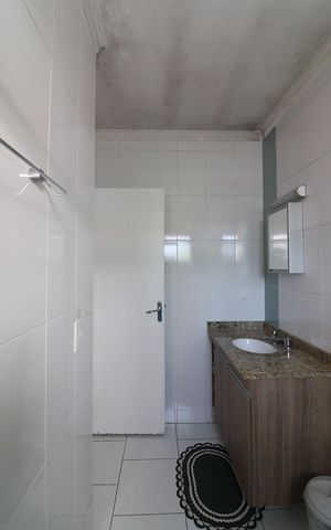 Casa de condomínio à venda com 198m², 3 quartos e 2 vagasBanheiro Social