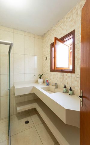 Casa de condomínio para alugar com 110m², 3 quartos e 4 vagas Casa de condomínio para alugar com 110m², 3 quartos e 4 vagasBanheiro da Suíte 1