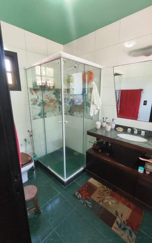 Casa de condomínio à venda com 267m², 4 quartos e 4 vagas