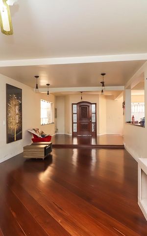 Casa à venda com 672m², 5 quartos e 2 vagasSala 2