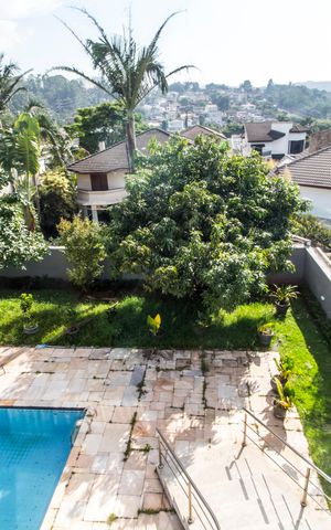 Casa de condomínio à venda com 600m², 4 quartos e 9 vagas Casa de condomínio à venda com 600m², 4 quartos e 9 vagasVista da Suíte