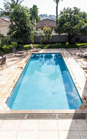 Casa de condomínio à venda com 600m², 4 quartos e 9 vagas Casa de condomínio à venda com 600m², 4 quartos e 9 vagasVista da Sala